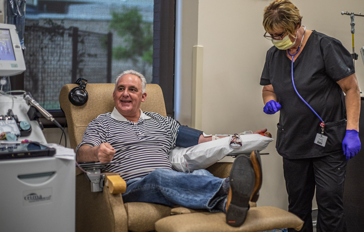 Sen. Paul Rosino, R-Oklahoma City, having plasma drawn by phlebotomist Tamara Mosley, at the Oklahoma Blood Institute.  Rosino has recovered from COVID-19 and answered the OBI’s call for convalescent plasma donations to help treat others who are seriously ill with the virus.