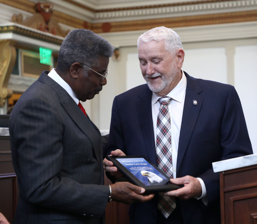 Sen. Larry Boggs, R-Wilburton (right) was presented with the Senator of the Year Award by the Oklahoma Veterans Council on Wednesday, March 27 at the State Capitol.  Giving the award is Mr. Pete Peterson, President of the Oklahoma Veterans Council.