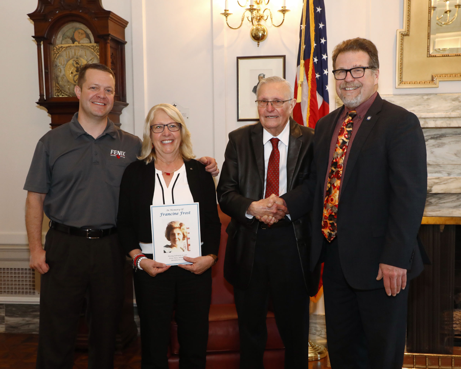 Francine Frost’s grandson, Cory Curl (left), daughter Vicki Frost Curl,  and husband Malcolm Frost, visit with Sen. Bergstrom (right) on Monday after  Francine’s Law passed unanimously in the Senate.