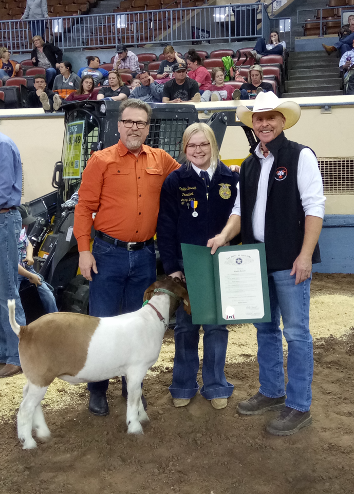 Senator Micheal Bergstrom, R-Adair (left) is joined by Rep. Rusty Cornwell and Bluejacket FFA president Maddie Bassett at the Oklahoma Youth Expo event at the State Fairgrounds this week.