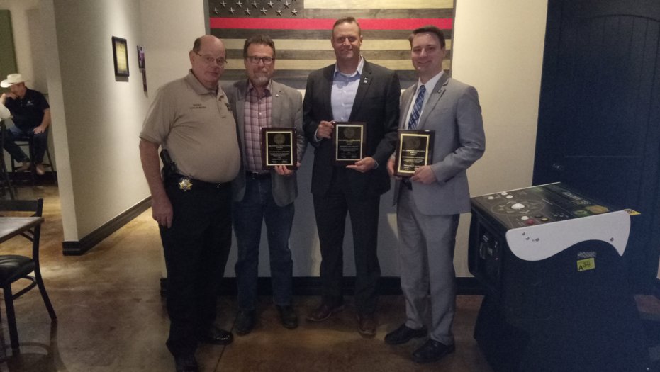 Sen. Micheal Bergstrom joins Delaware County Sheriff Harlan Moore (left) and State Representatives Josh West and Kyle Hilbert (right), at a ceremony September 24 to present the legislators with the Oklahoma Legislator of the Year award. 