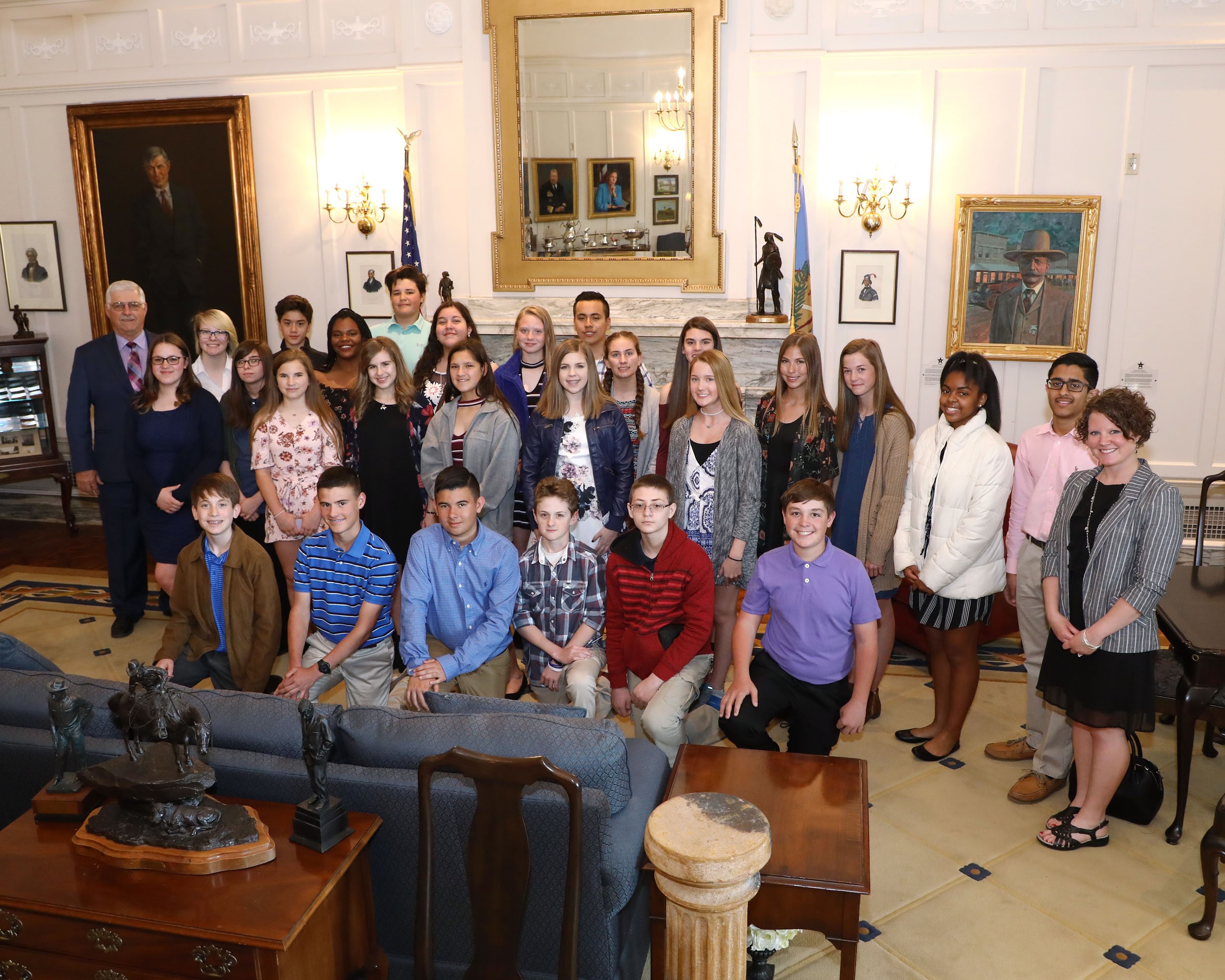 Senator Roland Pederson, R-Burlington, (left, back row) welcomes delegates from the National Junior Honor Society (NJHS) and Student Council (STUCO) last week at the State Capitol.  The student officers were joined by several other 8th grade students from DeWitt Waller Middle School, as well as principal Adam Beauchamp, NJHS sponsor Barbara Baker, STUCO Sponsor Dedra Fenley and Alan Siebel.