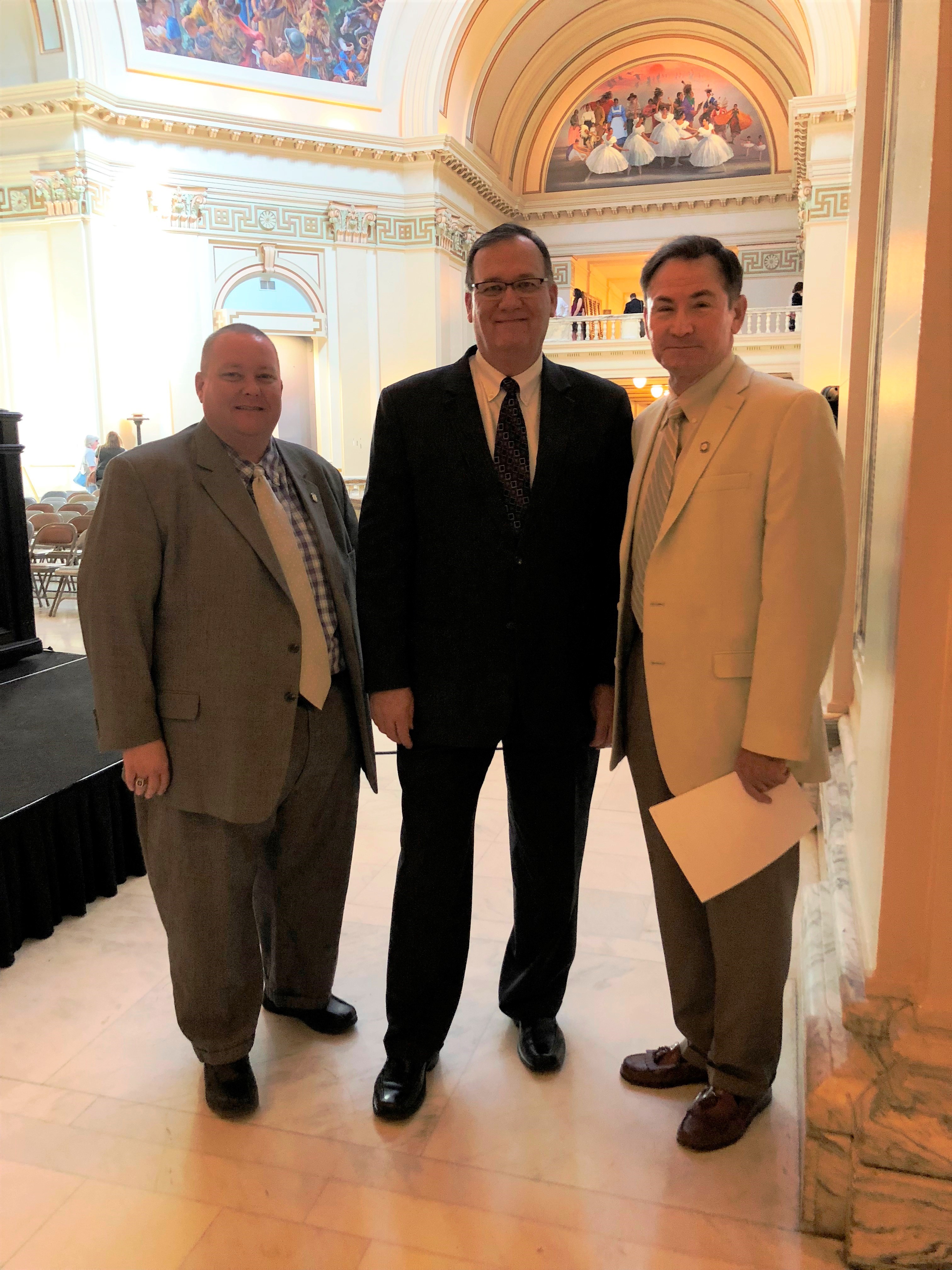 The Senate Health and Human Services Committee confirmed the appointment of Charles E. “Chuck” Skillings of Shawnee to the State Board  of Health Monday.  He is pictured with Sen. Ron Sharp, who carried his  nomination, and Rep. Dell Kerbs both of Shawnee.