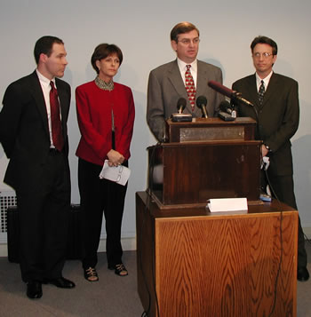 Senate Minority Jim Dunlap at the podium with Minority Whip Scott Pruitt, Sen. Carol Martin and Asst Minority Leader Jim Williamson call for audit of OHCA.