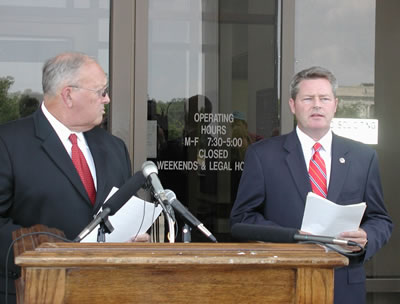 Senator Richard Lerblance (D-Hartshorne) yields to Senator Rabon (D-Hugo) during a press conference held September 2, 2004.  The senators called the press conference to request a multi-county grand jury investigate the actions of the Oklahomans for Lawsu