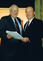 ODOT Director Gary Ridley with Sen. Frank Shurden with a copy of HB 1176, which will more than double annual funding for road maintenance for the next five years.