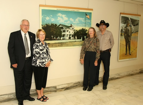 Sen. David and Sara Myers pose alongside the State Capitol print they sponsored of the majestic 101 Ranch residence headquarters, the Miller Mansion, with the 101 Ranch OTA President Jean Evans and Sec/Treasurer Joe Glaser.