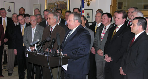 Senate President Pro Tem Glenn Coffee, House Speaker Chris Benge and members of the Republican caucus address the passage of federal health care reform legislation at the state Capitol on Monday.  