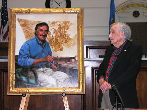 Artist Charles Banks Wilson admires his portrait.