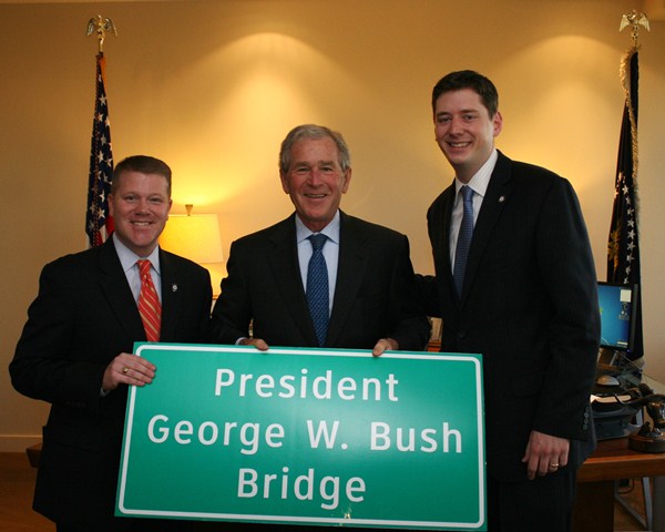 Rep. Mike Sanders and Sen. David Holt with former President George Bush in his Dallas office.