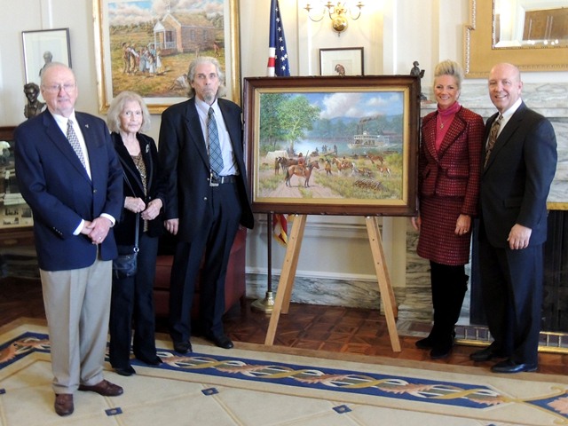 Former Sen. Charles Ford poses with artist Wayne Cooper and his wife and sponsors Marnie and Clayton Taylor. 