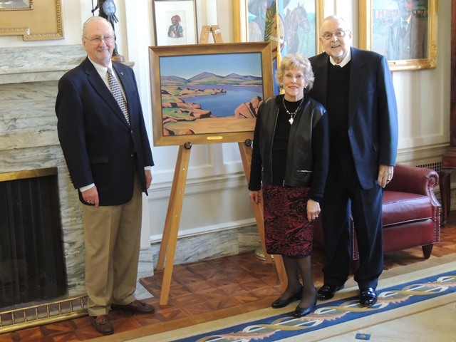 Former Sen. Charles Ford poses with the sponsors of the Jacobson painting Carlene and Bob Rollins.