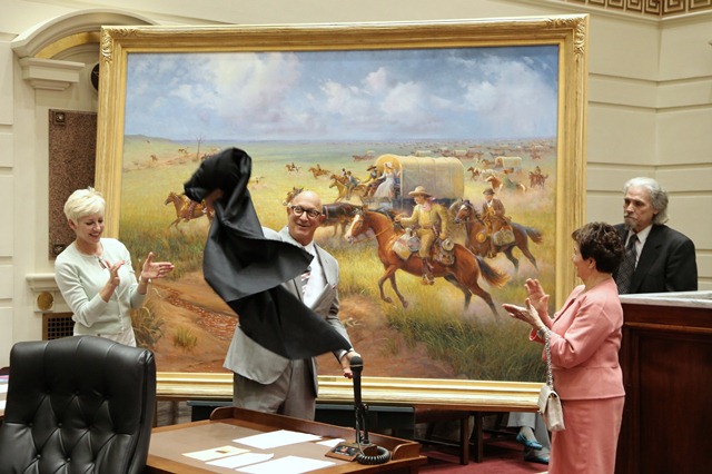 Painting sponsor Brad Naifeh and artist Wayne Cooper unveil “Land Run of 1889” in Senate Chamber Monday alongside Brad’s wife, Valerie, (on left) and his mother, Jeaneen (on right).