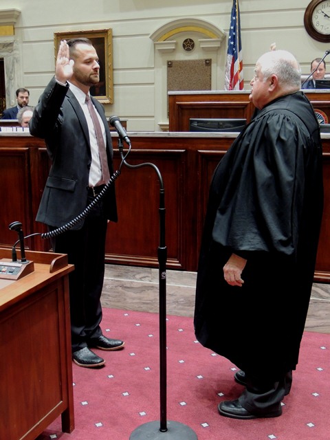 Senator  J.J. Dossett was sworn in by Oklahoma Supreme Court Justice John Reif during a ceremony held Thursday at the state Capitol in the Senate Chamber.