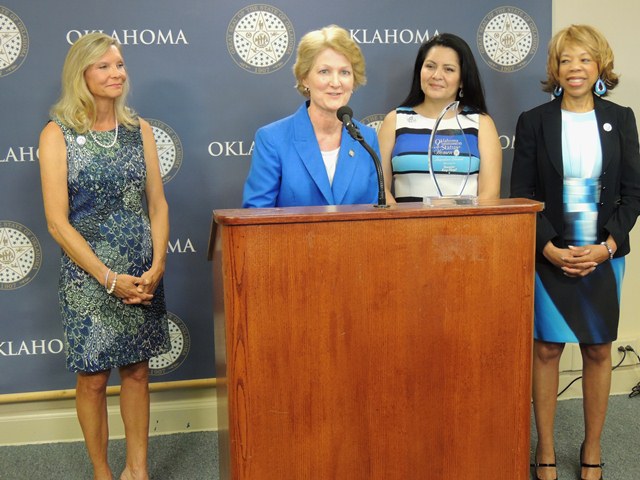 The Oklahoma Commission for the Status of Women (OCSW) presented Sen. Kay Floyd (D-Oklahoma City) with the 2017 Guardian Award at the state Capitol Wednesday.  Pictured L-R: OCSW Chair Maria Trapp-Braly, Sen. Floyd, OCSW Vice Chair Gloria Torres and OCSW