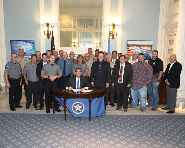 Left to right: Cleveland County Undersheriff, Blake Green; Seminole County Sheriff Shannon Smith; Rep. Zack Taylor; Cleveland County Sheriff Todd Gibson; Delaware County Sheriff Harlan Moore; Hughes County Sheriff Marcia Maxwell; Sen. Micheal Bergstrom; 