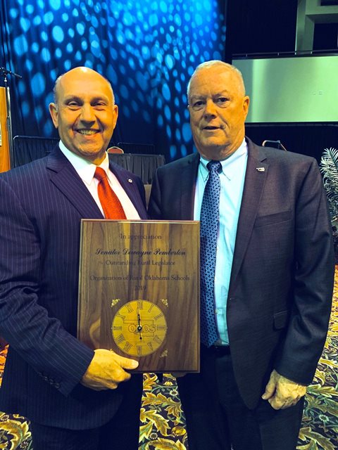 At their annual fall conference, OROS Executive Director Don Ford presented Sen. Dewayne Pemberton with the Rural Legislator of the Year award for his strong support and dedication to protecting rural schools.  